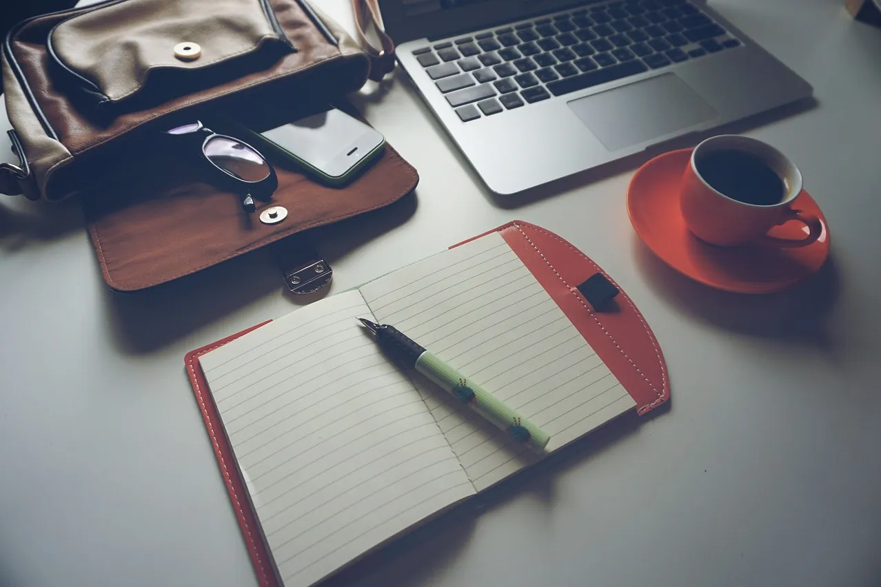 Laptop, coffee, notebook