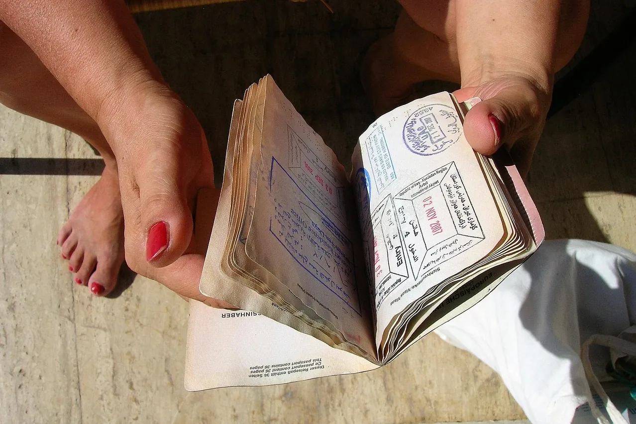 Passport, visa, rubber stamp