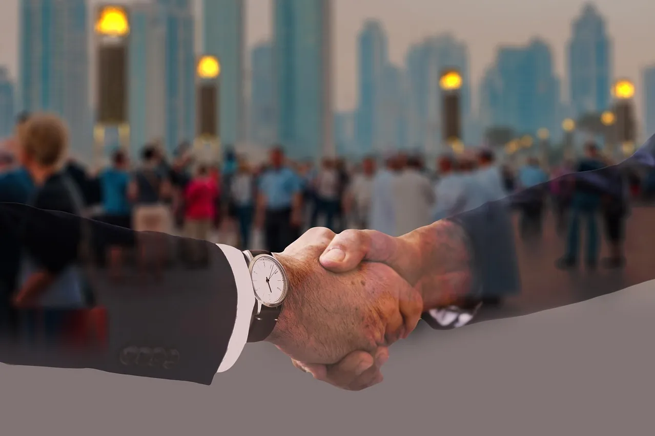 Handshake, shaking hands, men's suit